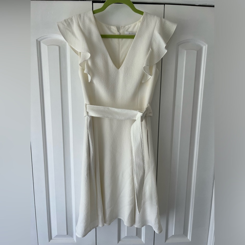 White textured Black Halo dress with belt